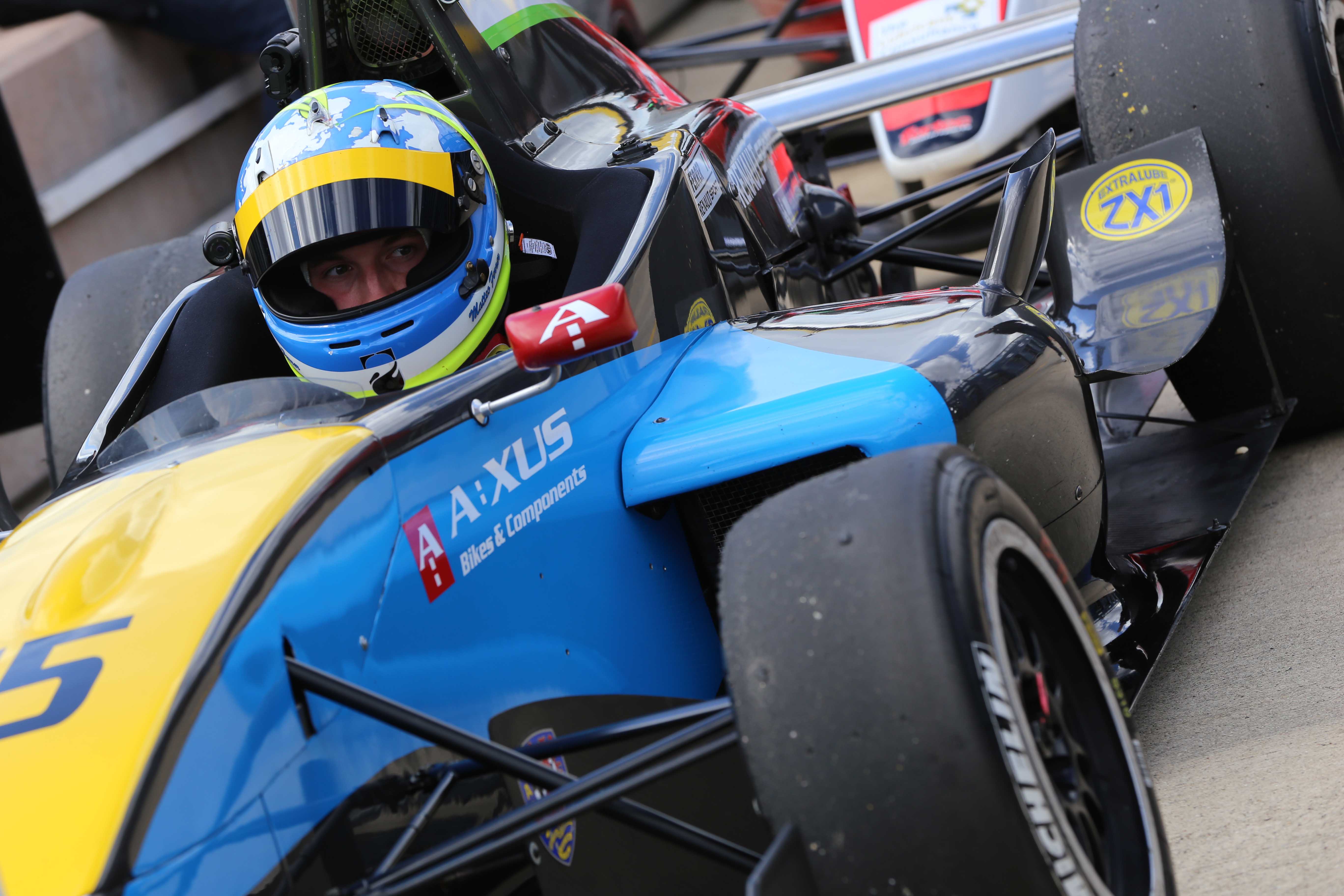 matteo ferrer sits in his MGR Protyre Formula Renault BARC waiting to qualify at rockingham 2013