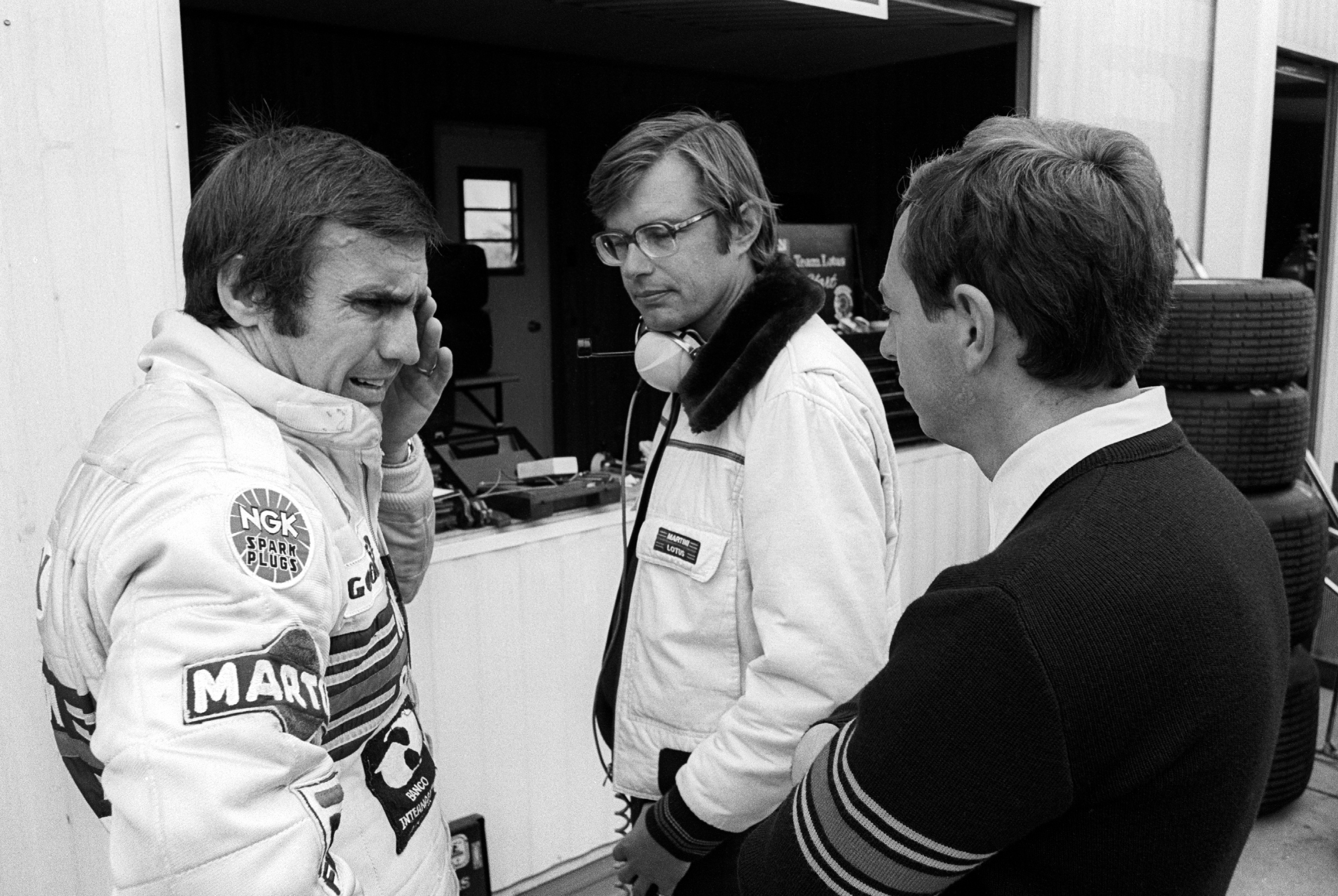 Carlos Reutemann (ARG) Lotus (Left), who retired from the race on lap 24 with a broken suspension, with Peter Collins (AUS) Lotus Team Manager (Right). Canadian Grand Prix, Rd 14, Montreal, Canada, 30 September 1979.