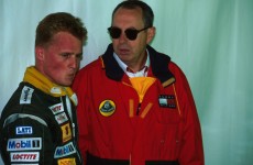 Lotus team principal Peter Collins (GBR) talks with Johnny Herbert (GBR) after his retirement from the race
Italian GP, Monza, 11 September 1994